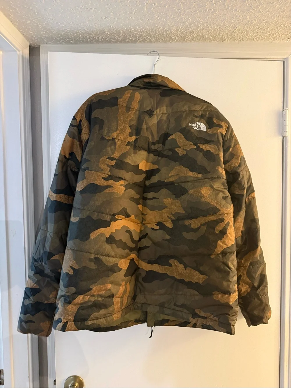 The North Face Men’s Camo Puffer Jacket in Olive and Tan